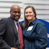 Quincy Williams poses with woman